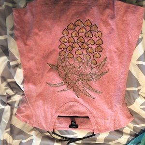 Pink shirt with pineapple on it